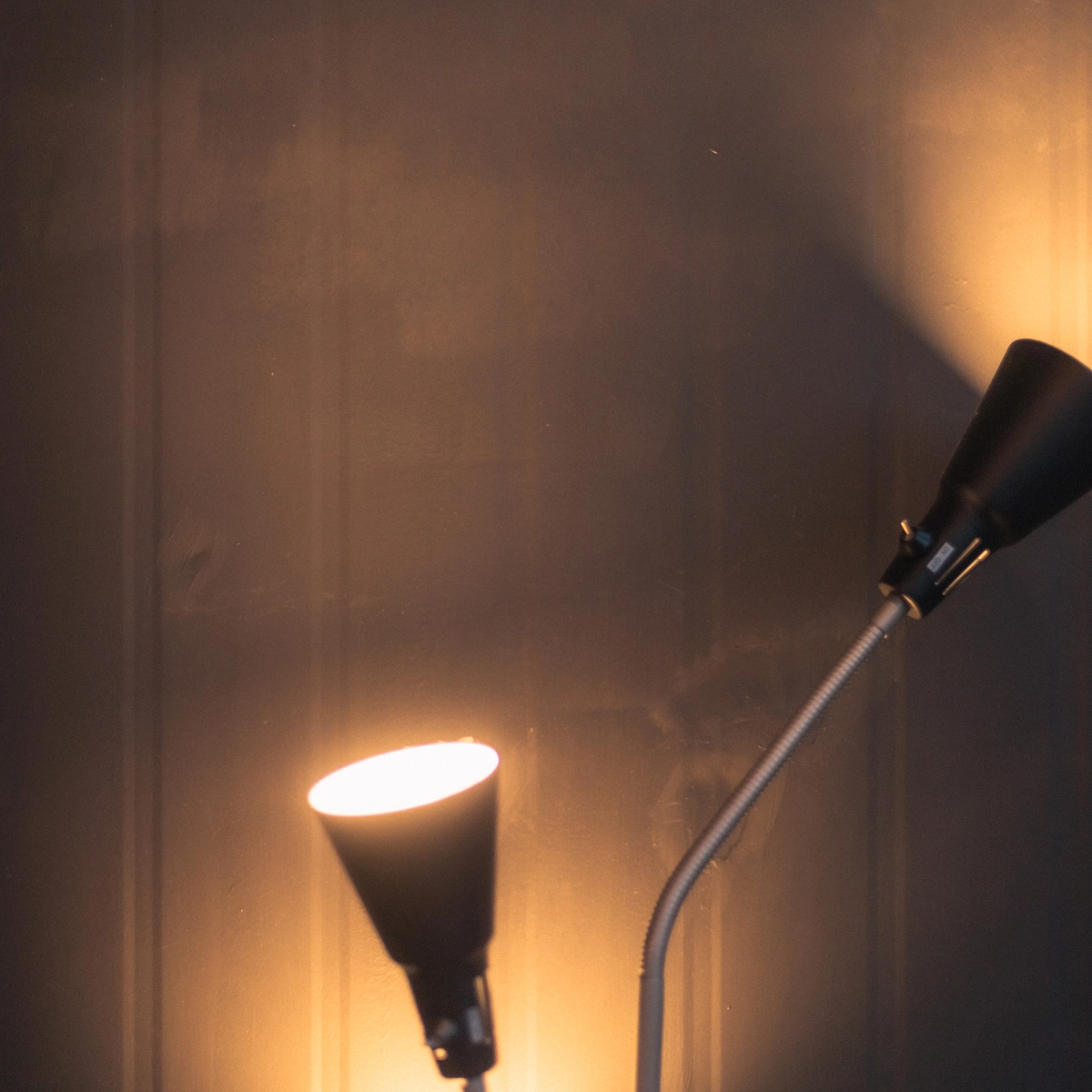 Glowing LED Bulbs Against Dark Wall