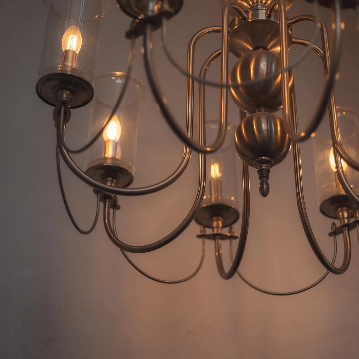 Elegant pendant chandeliers with warm Edison bulbs